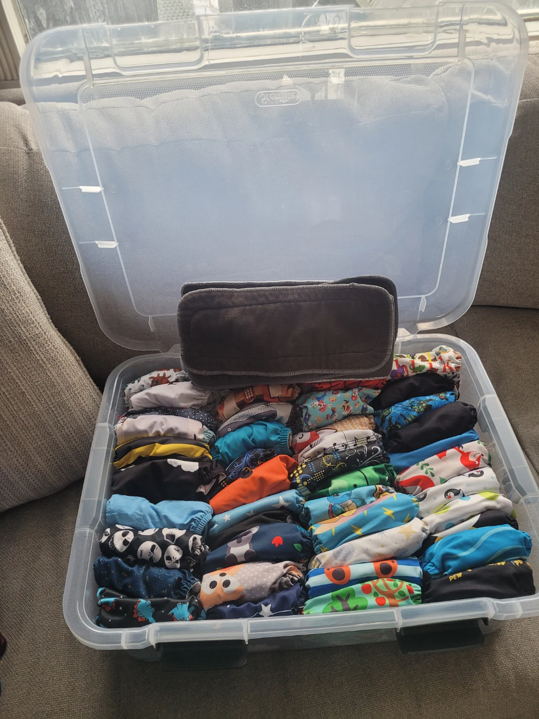 HUGE cloth diaper bundle, with liners and a nice container