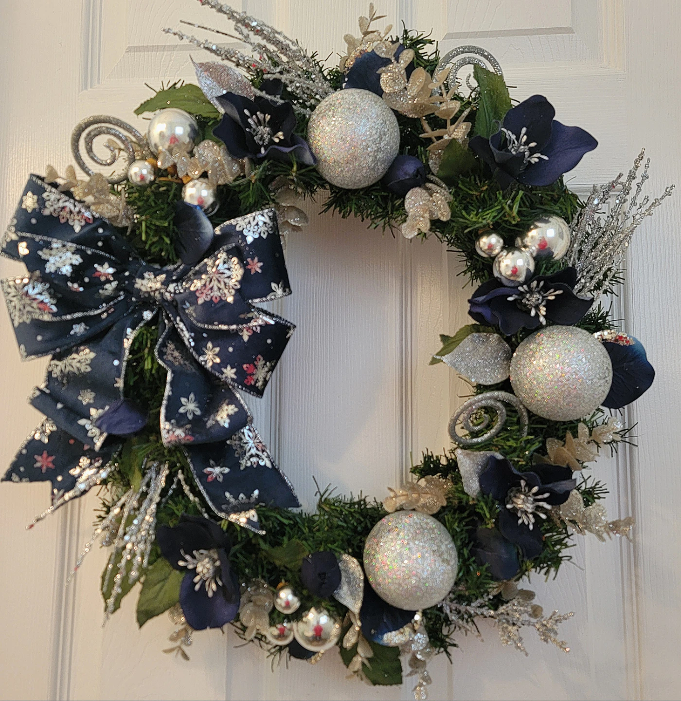 Festive Christmas Wreath with Bow and Ornaments