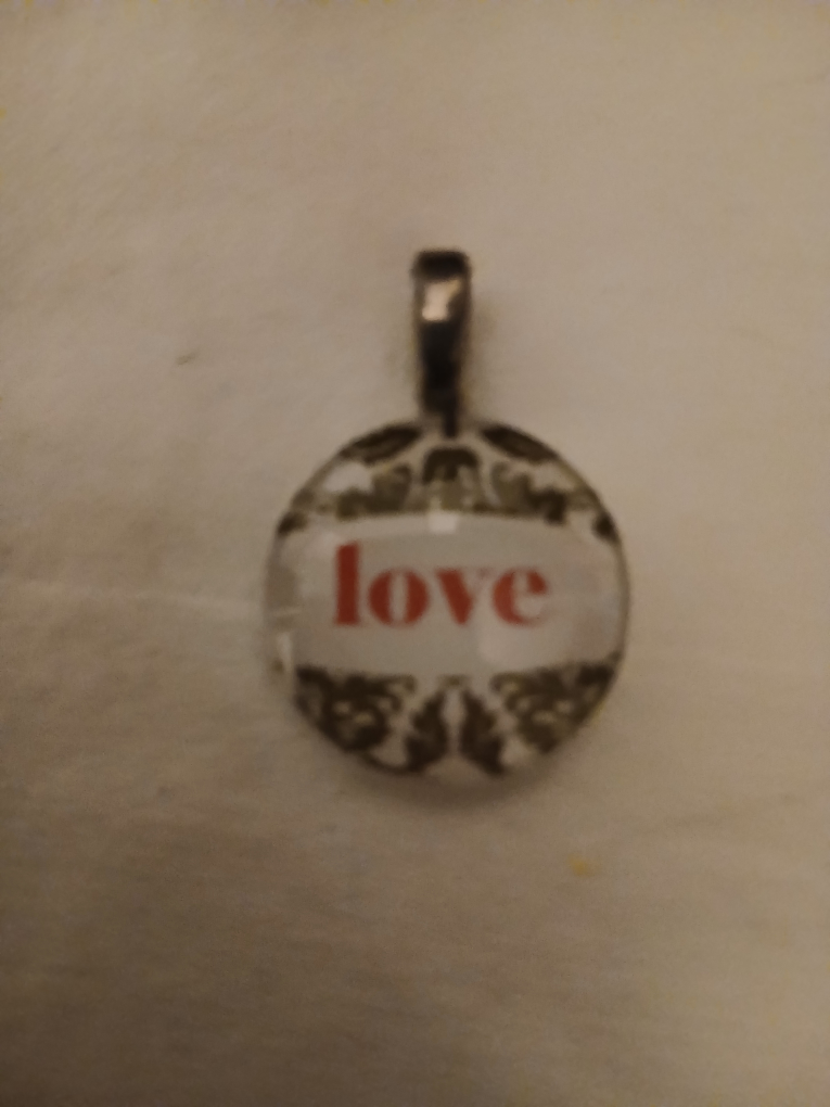 Pendant with 'love' inscription