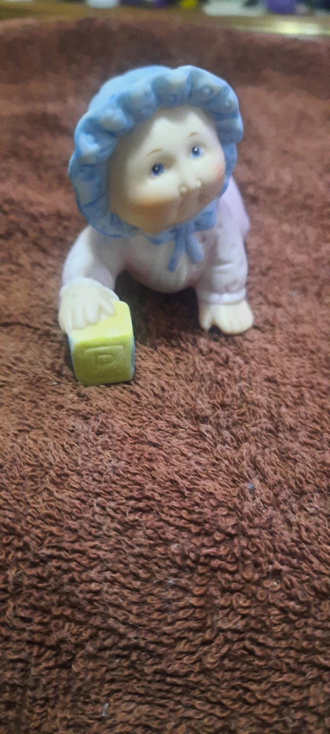 Collectable glass cabbage patch figurins