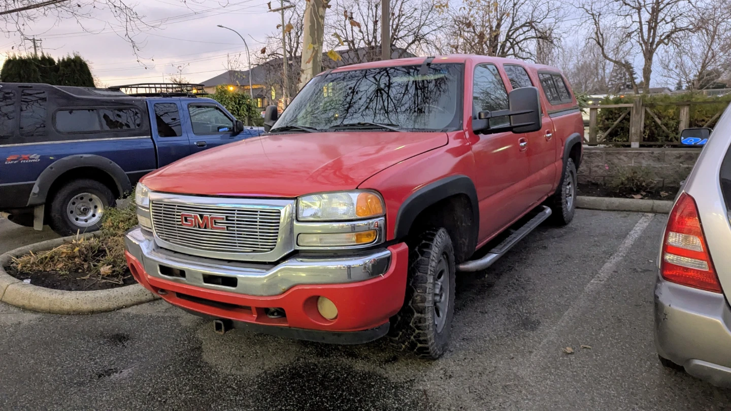 2005 Red GMC 1500 Z71 Sierra with Cap