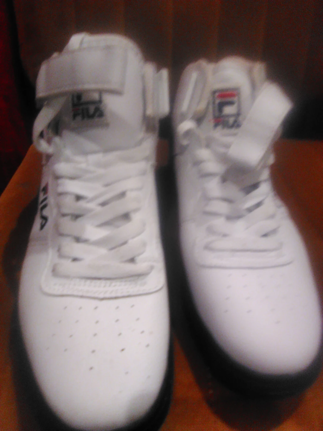White Fila Mid-Top Sneakers