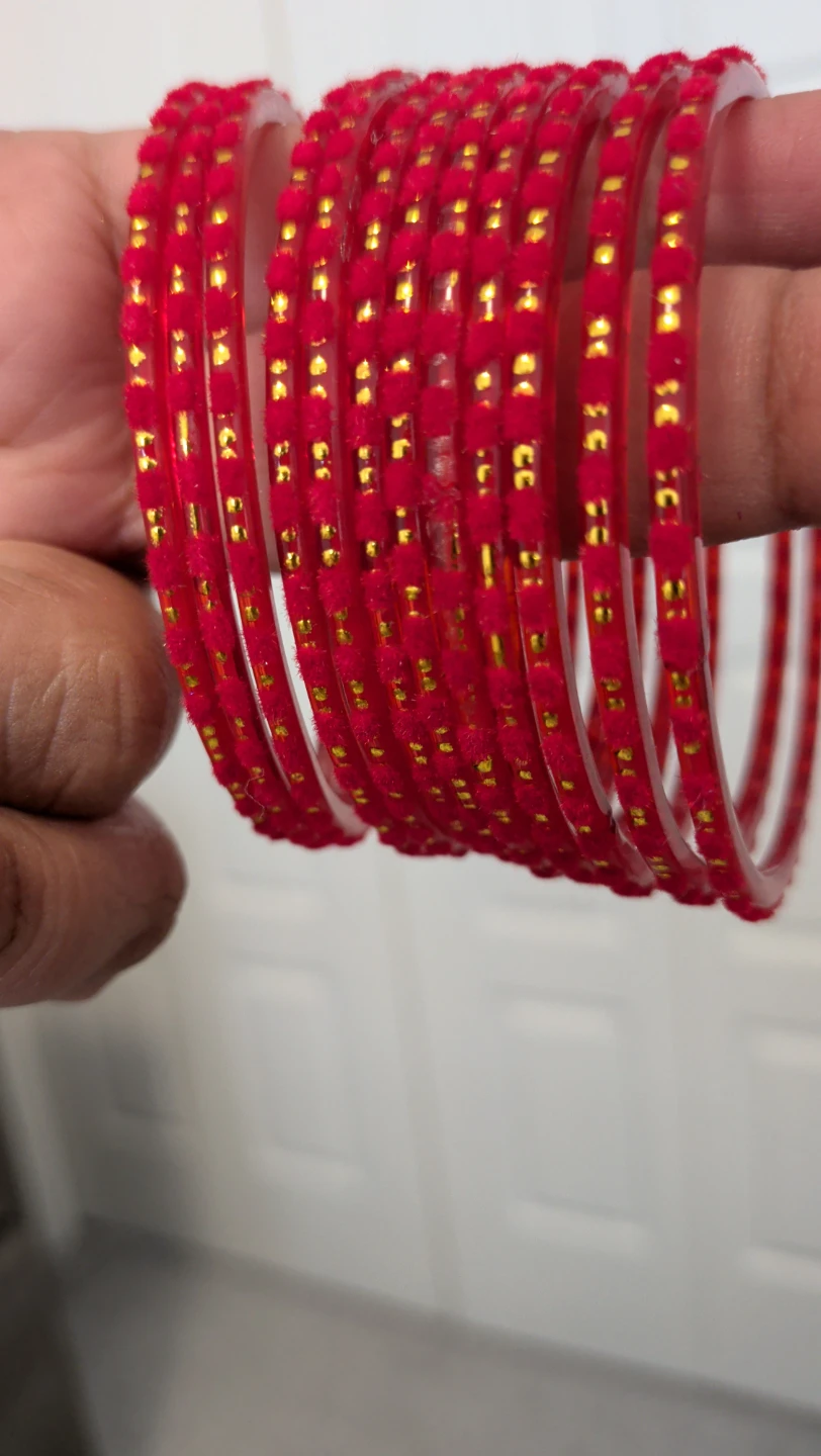 Set of Colourful Bangles with Gold Accents