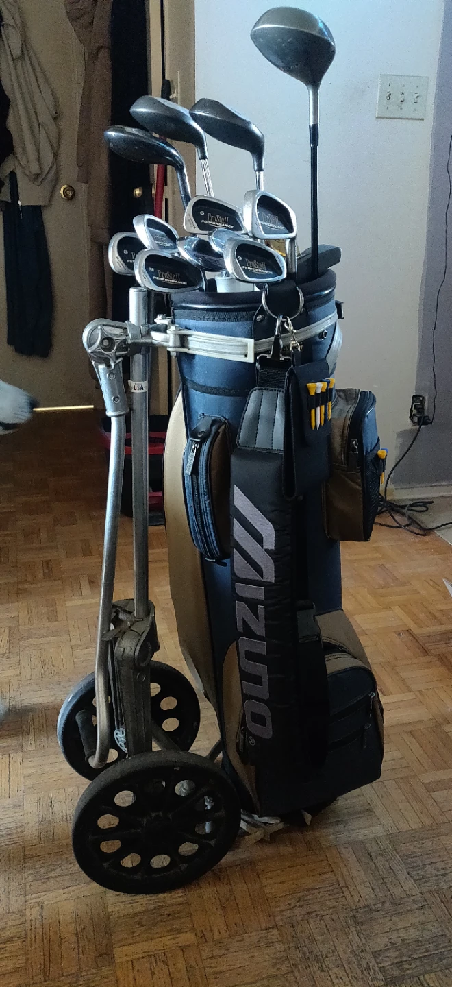 Mizuno Golf Bag with Assorted Clubs and Accessories