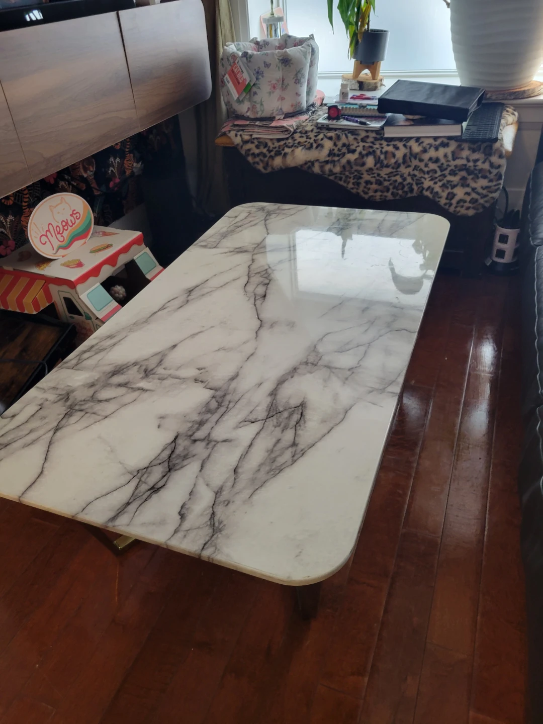 Marble top coffee table with gold legs