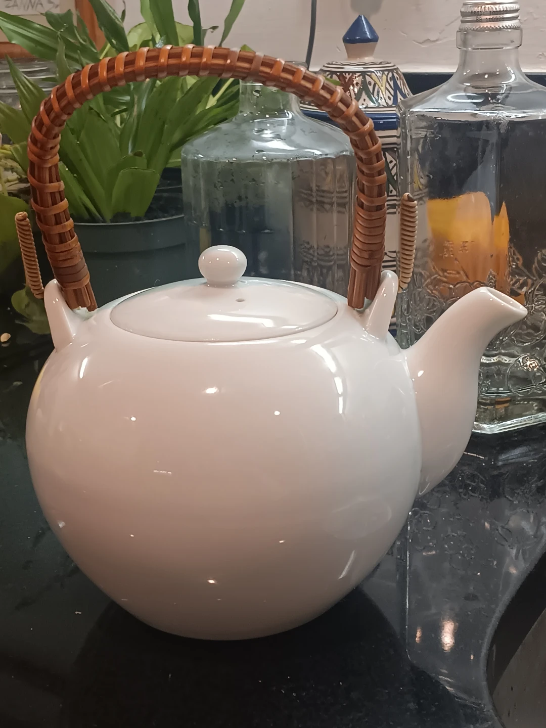 White Ceramic Teapot with Wicker Handle