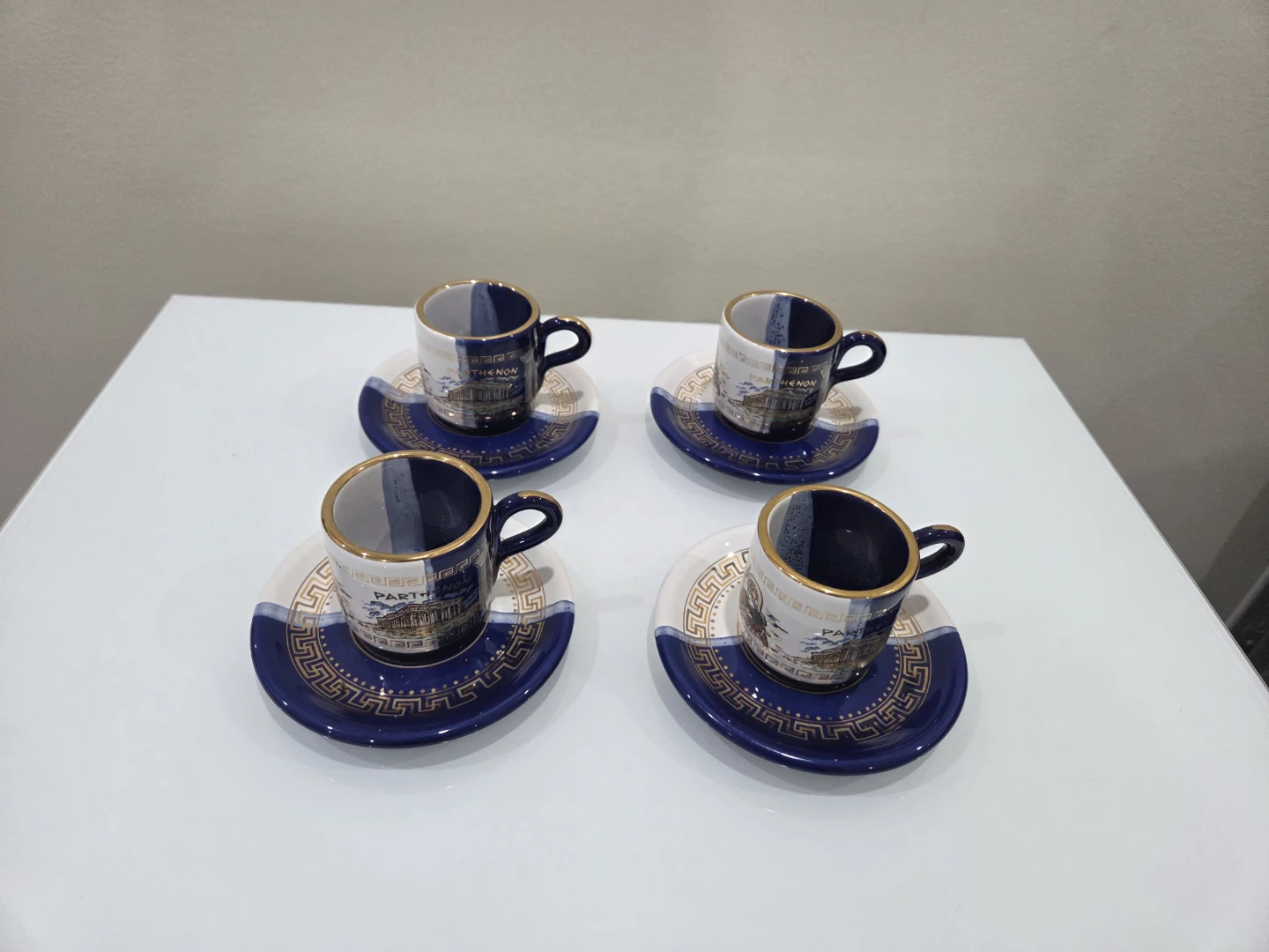 Set of 4 espresso cups and saucers