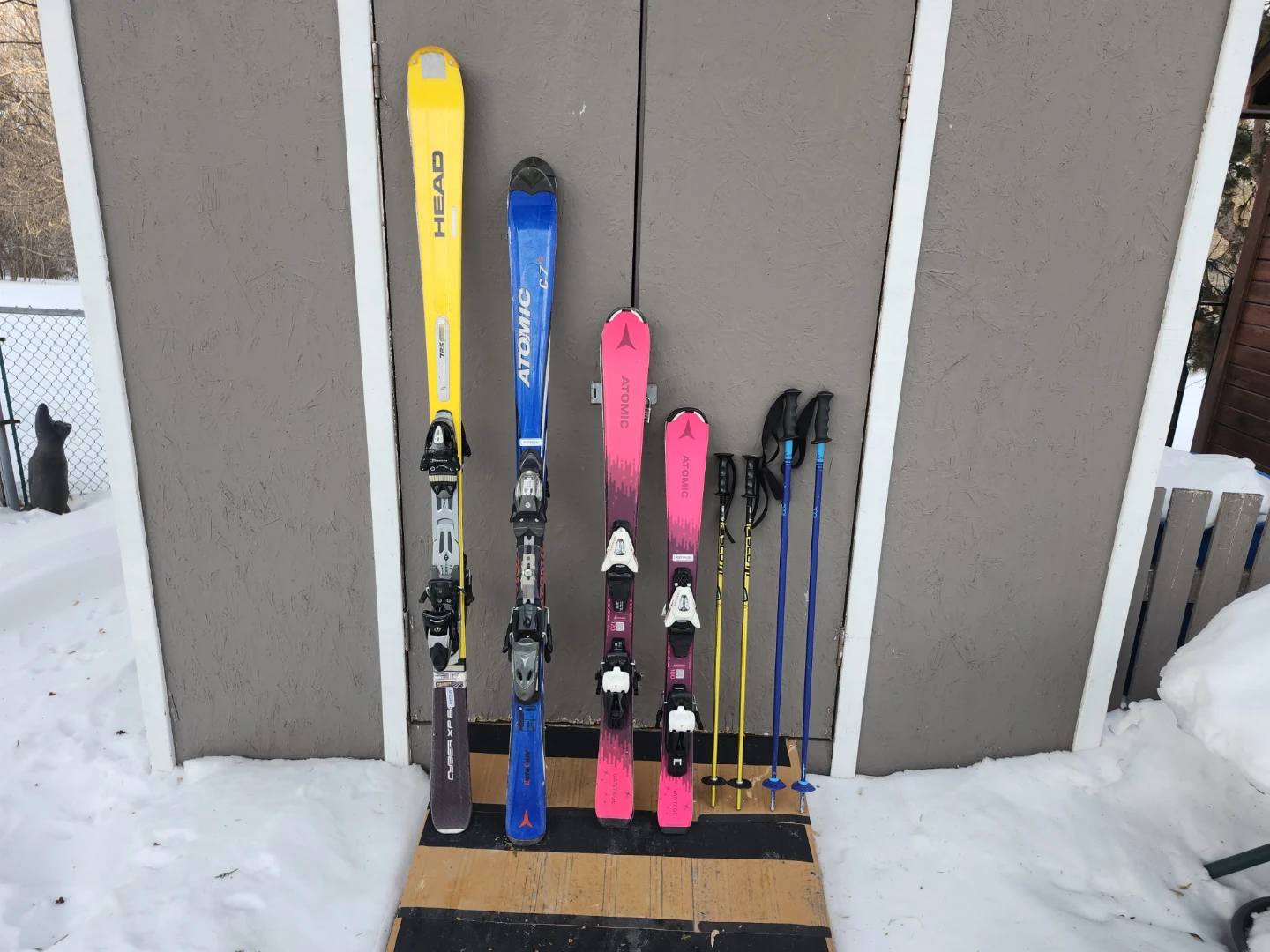 skis and poles set 66 in, 58 in, 47 in, 39 in