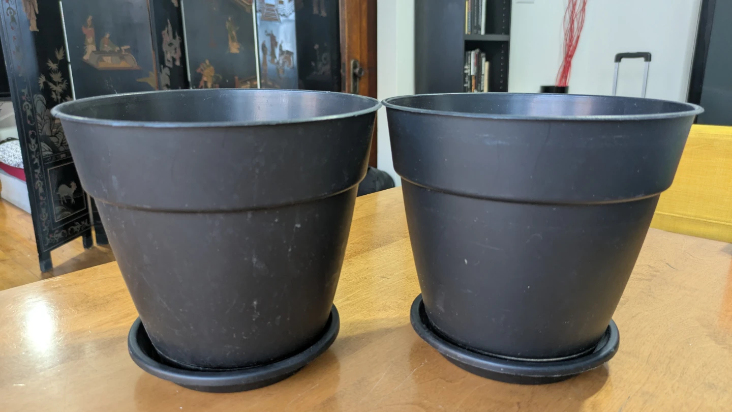 Set of 2 Black Plastic Plant Pots with Saucers