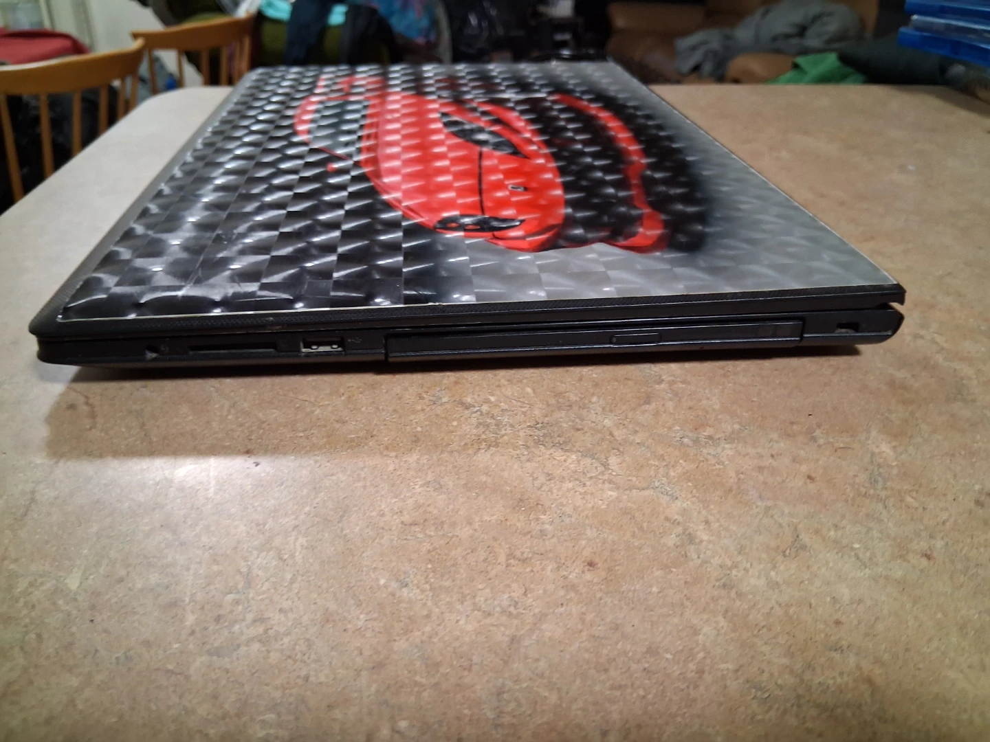 Lenovo Laptop with Red Sports Car Design
