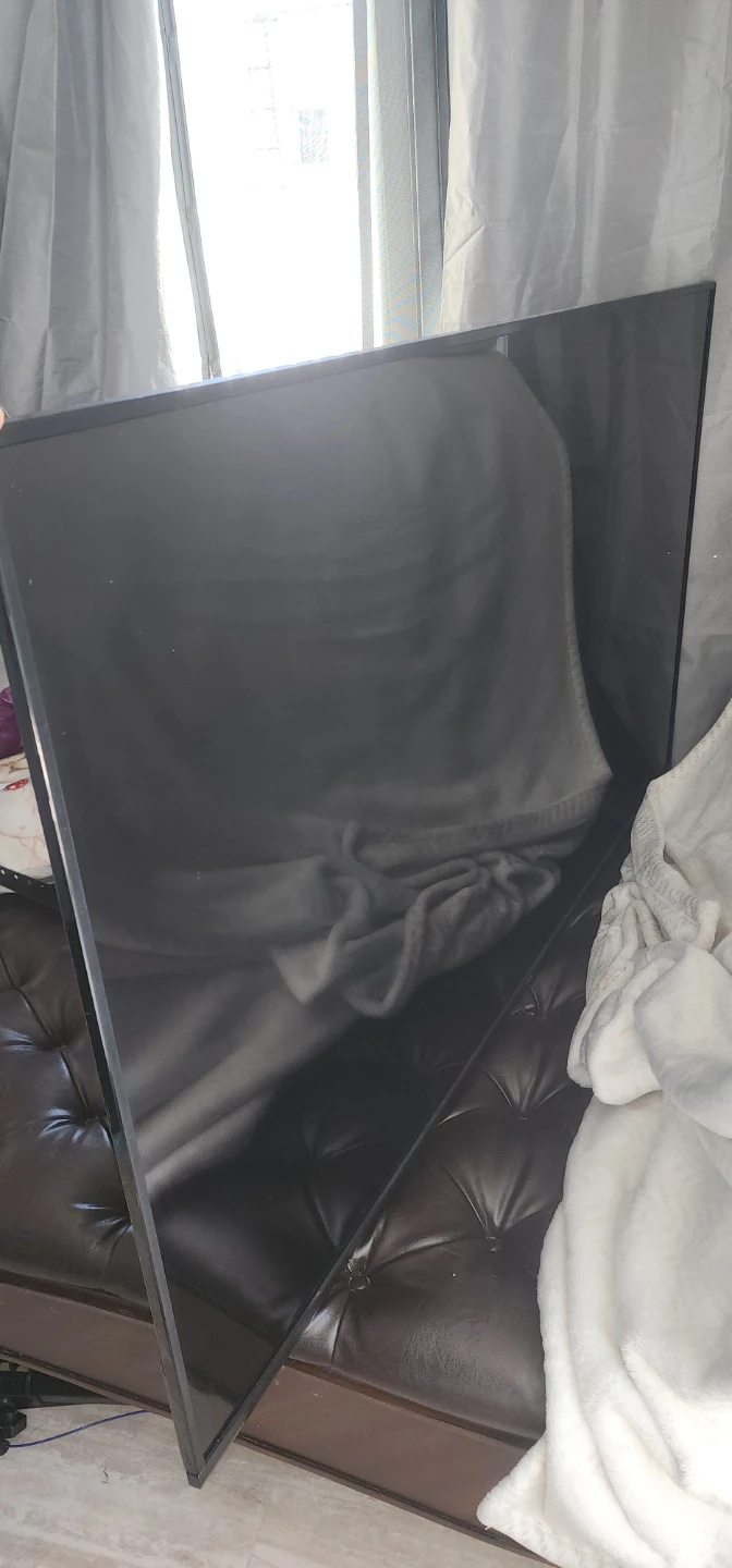 TCL 65" 4K UHD Roku Smart TV - photo 2
