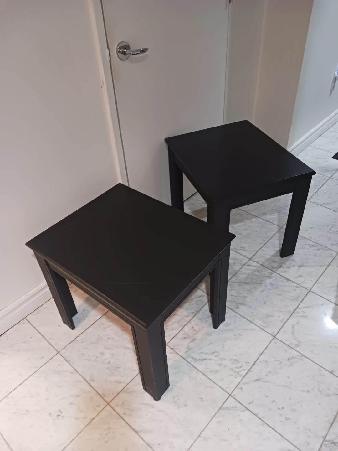 Set of two black side tables