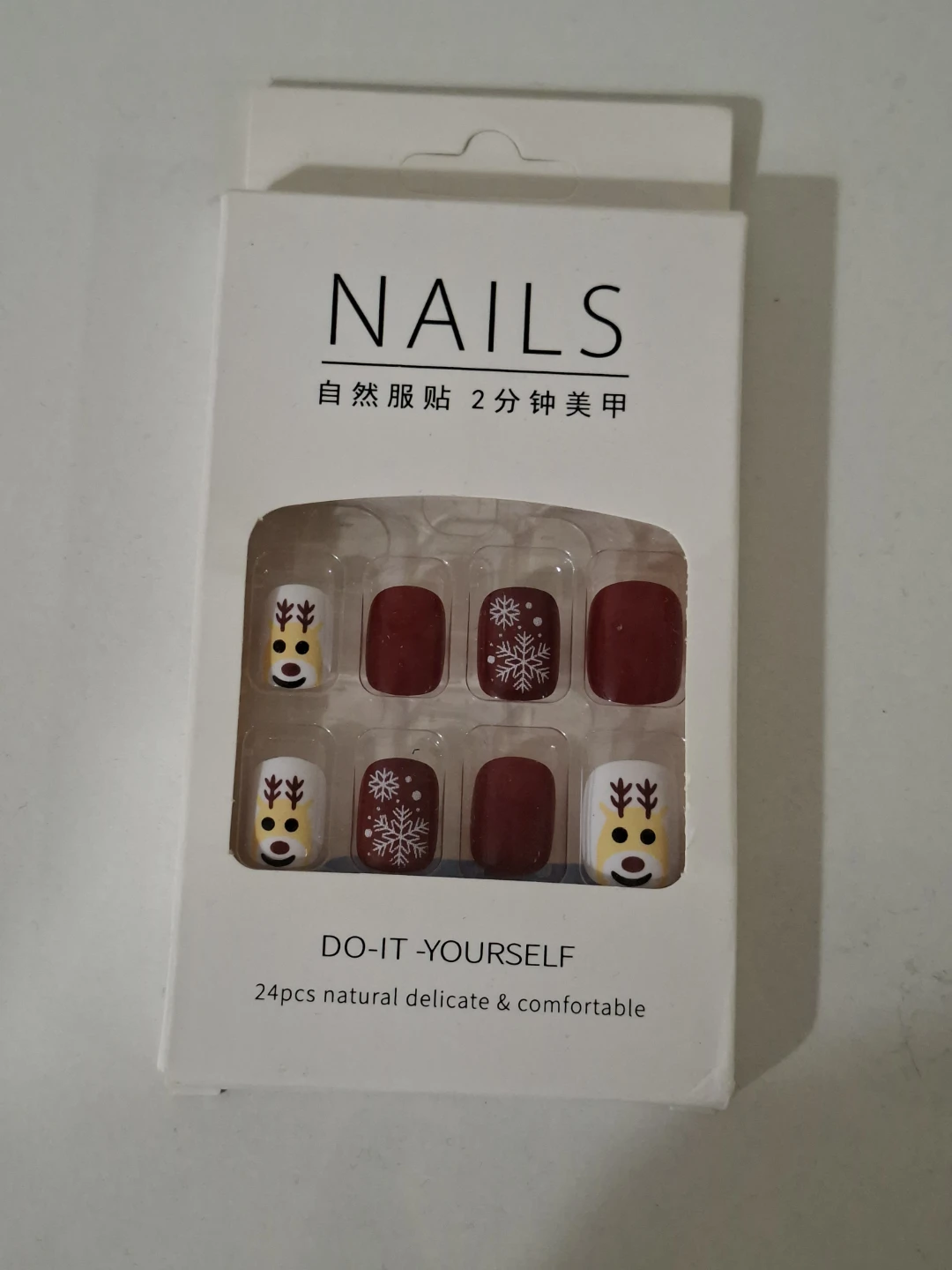 Winter holiday-themed press-on nails