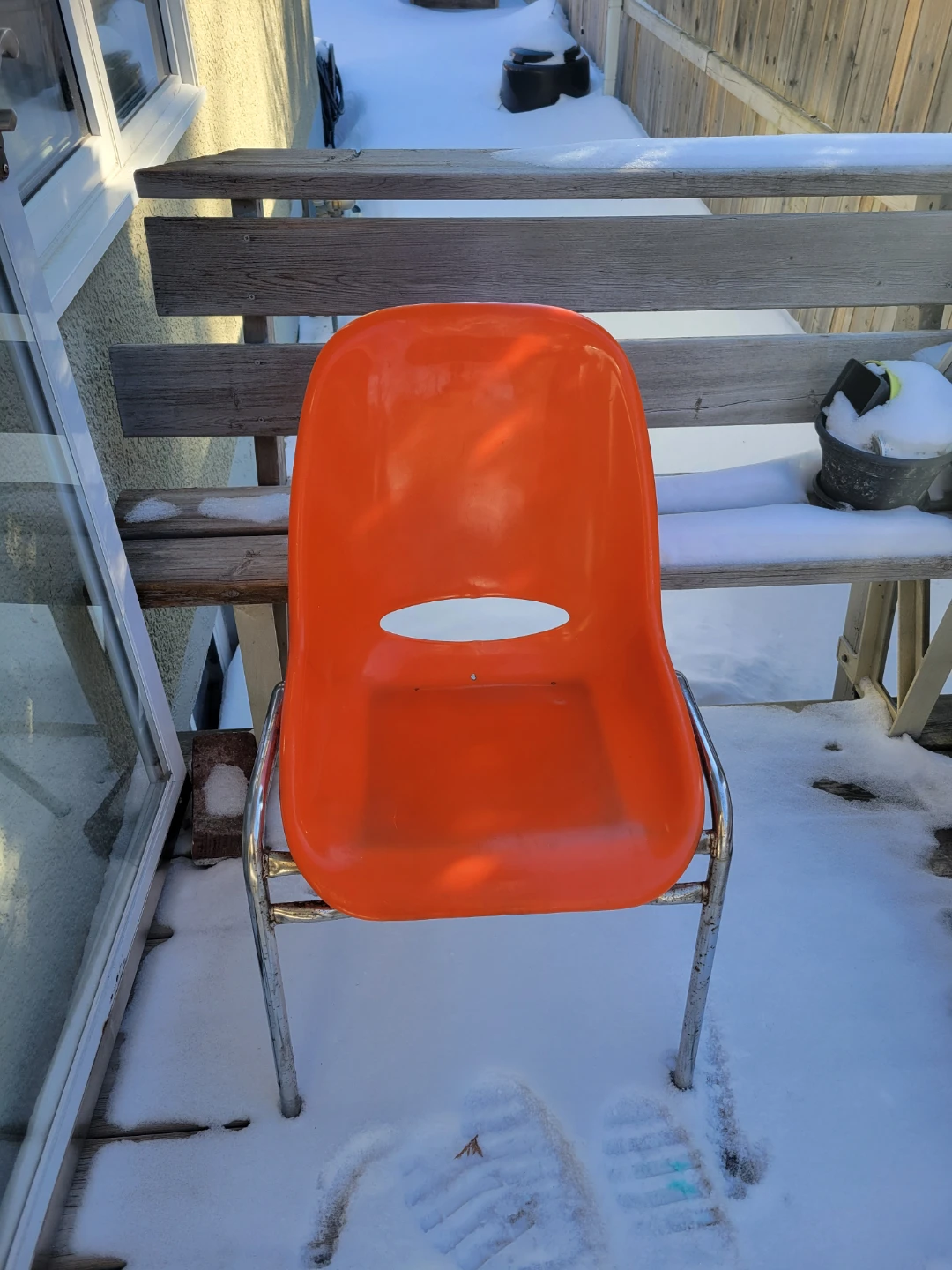 Orange Plastic Chair with Chrome Legs