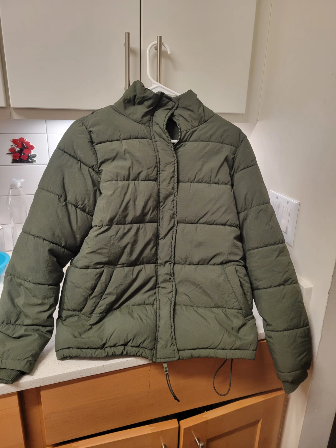 Green puffer jacket