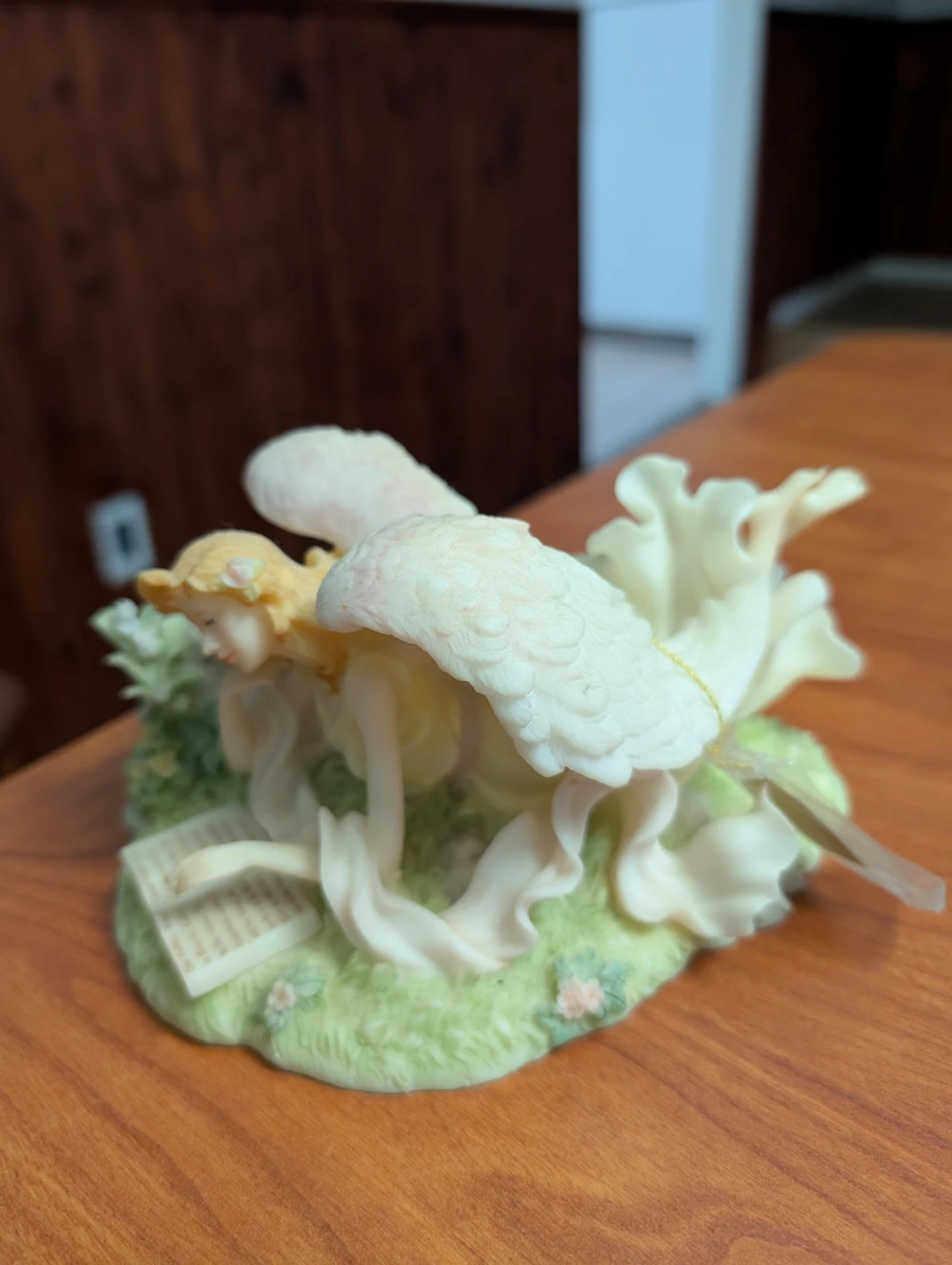 Angel Figurine Reading a Book