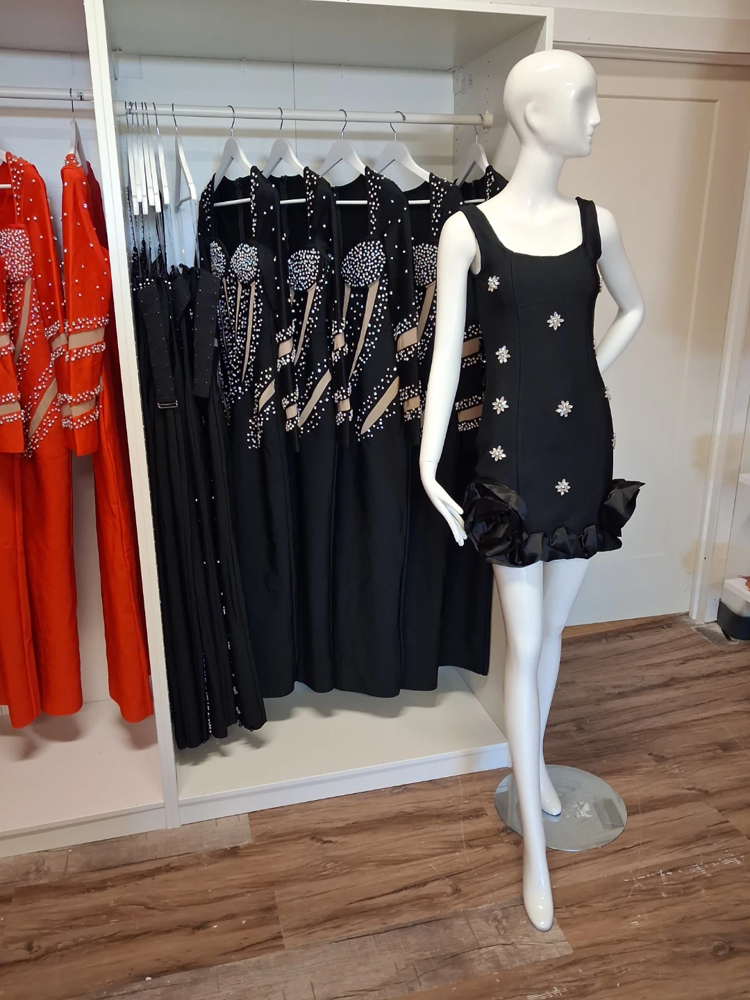 Black Ruffled Dress with Floral Embellishments