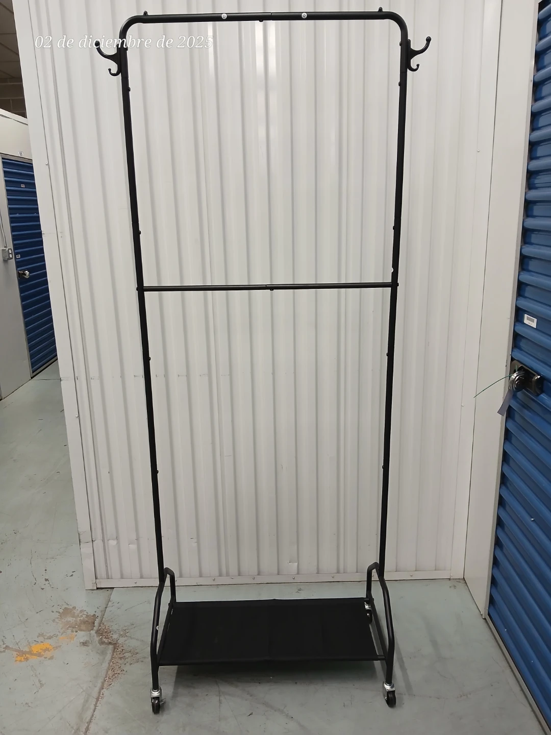 Rolling clothes rack Double Garment Rack bottom shelf - photo 3