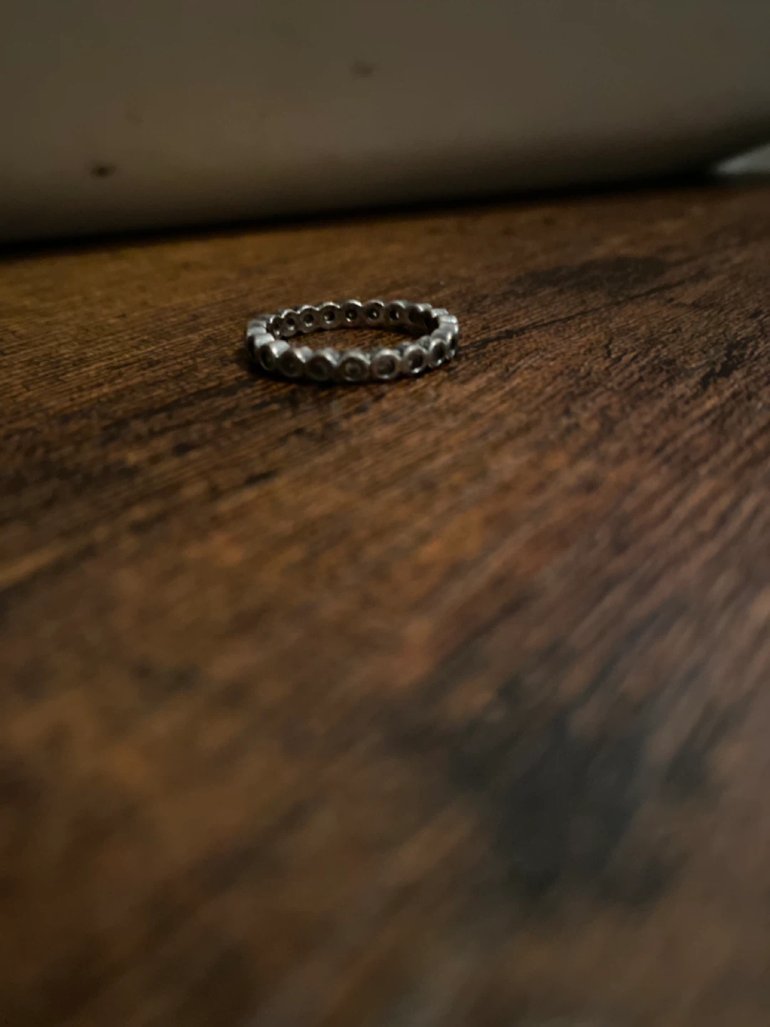 Silver band ring with cubic zirconia accents