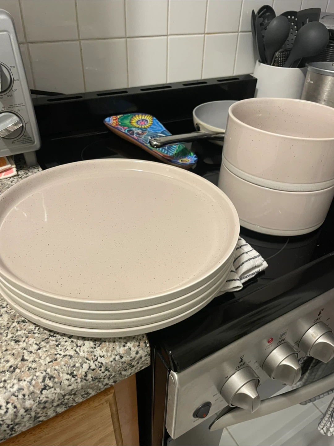 Set of speckled ceramic dinner plates + bowls