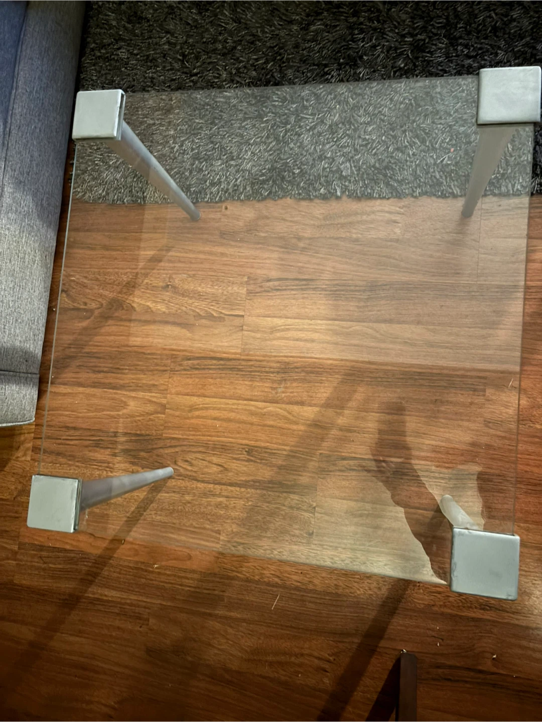 Glass top coffee table with grey legs - photo 4