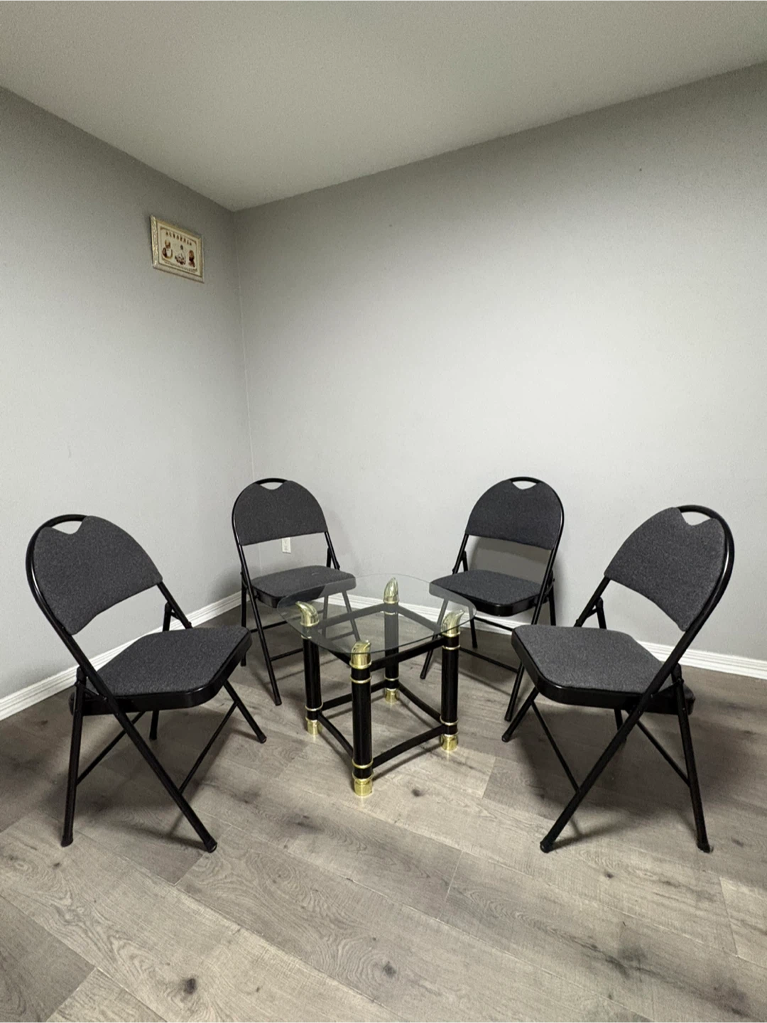 Set of 4 Folding Chairs and Glass Coffee Table