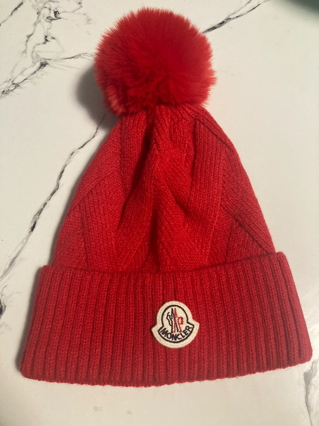 Brand new Red beanie hat with removable Pom Pom