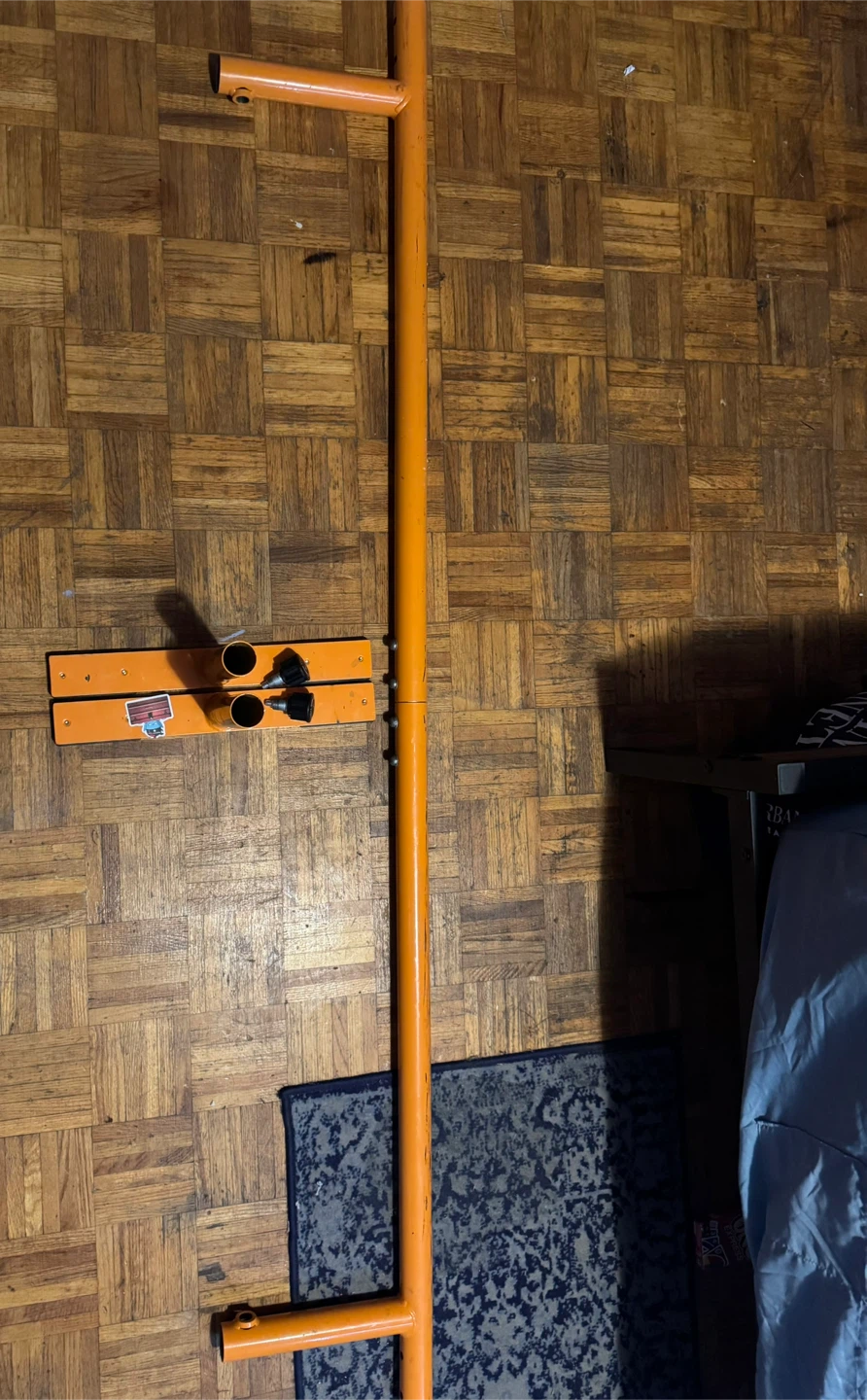 Orange Metal skate rail with Base Stands