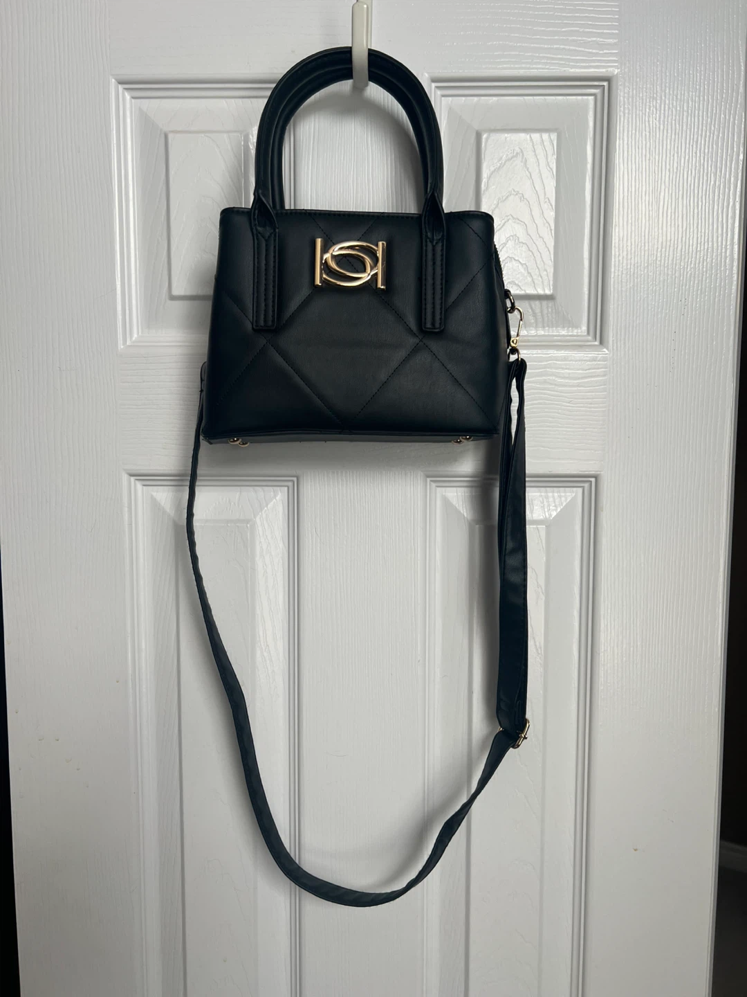 Small black bag by Bebe