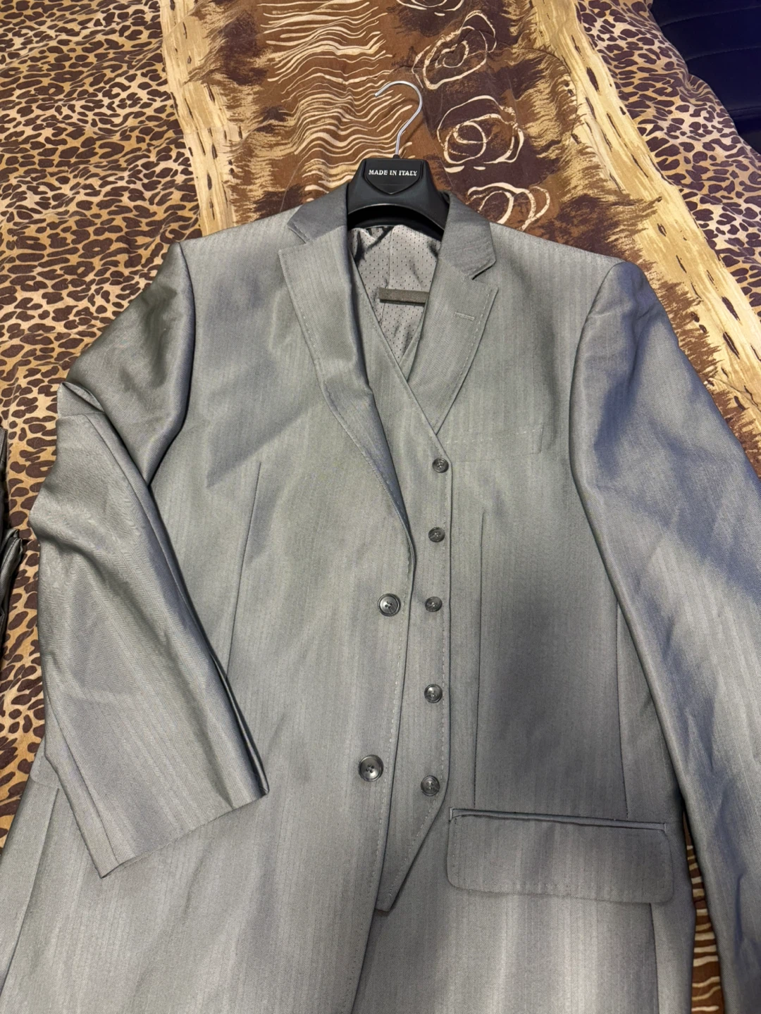 Men’s silver suit from Italy.