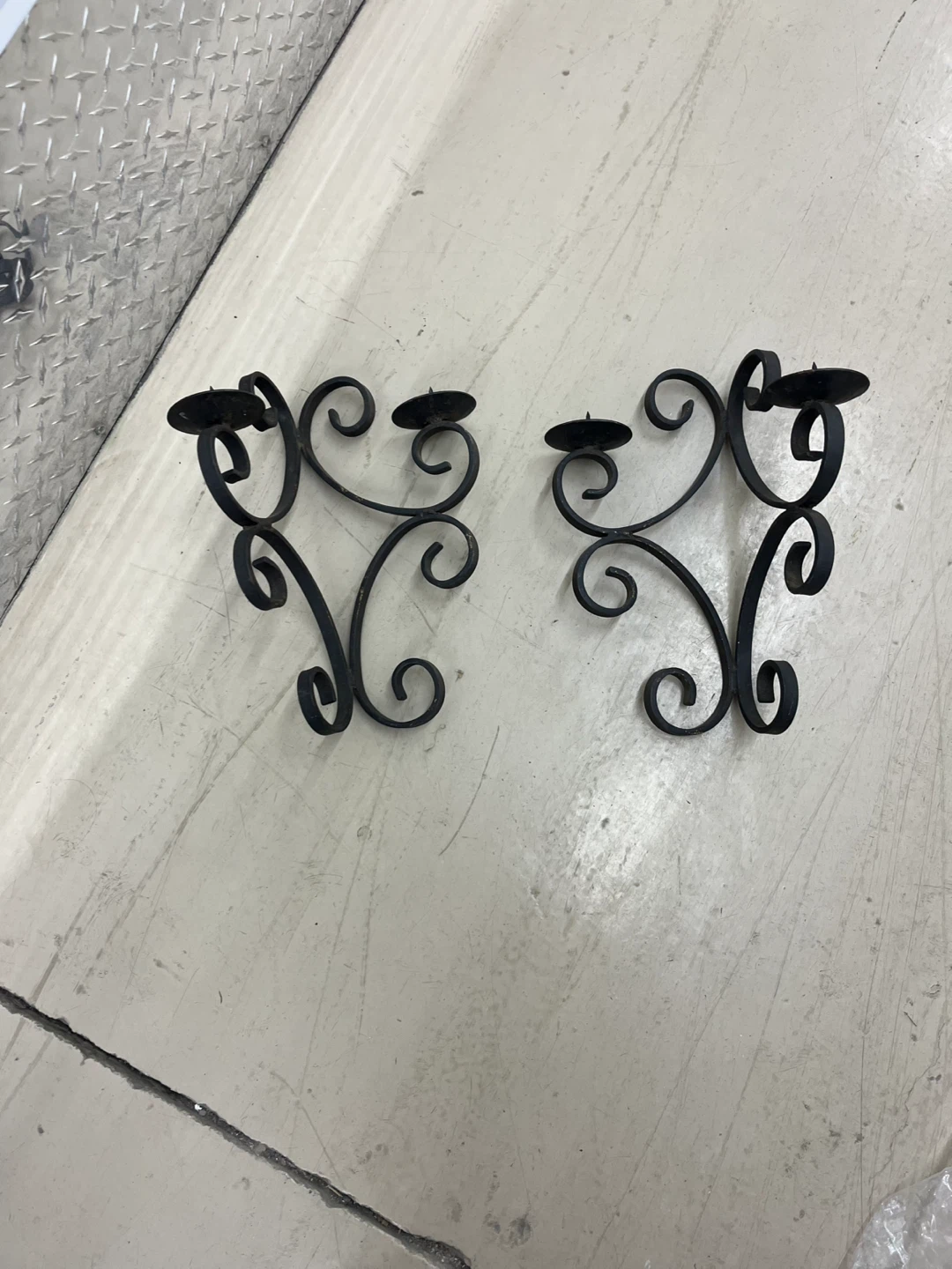 Pair of Black Metal Scroll Sconces