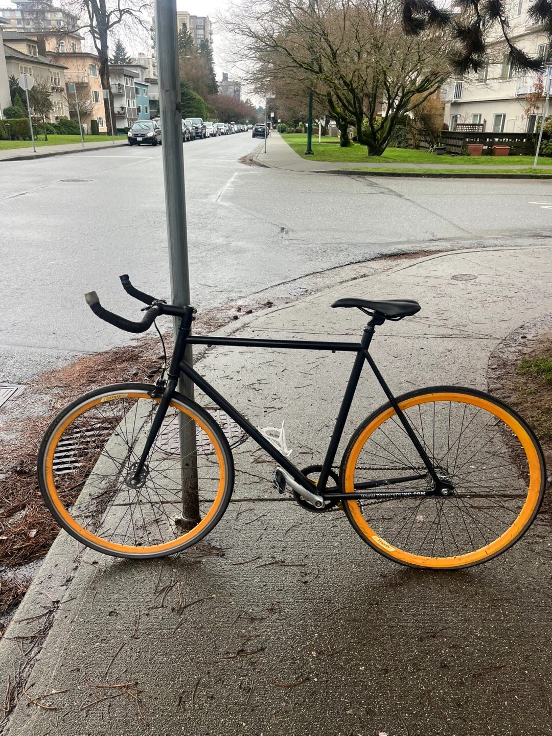 Black Single Speed Bicycle with Orange Rims