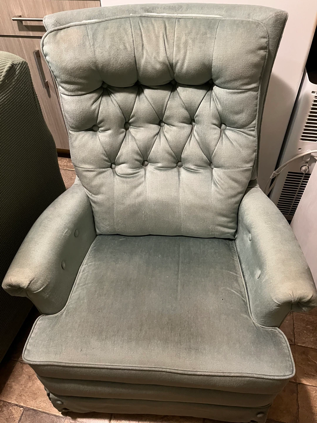 Light green recliner/rocker