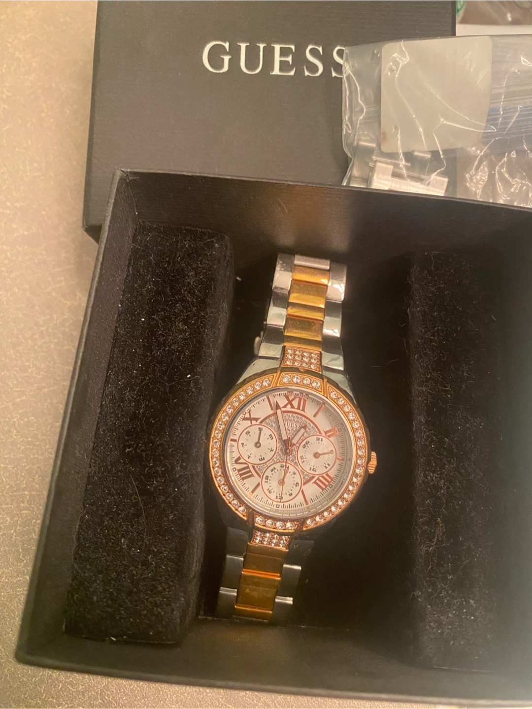 Guess women’s analog watch