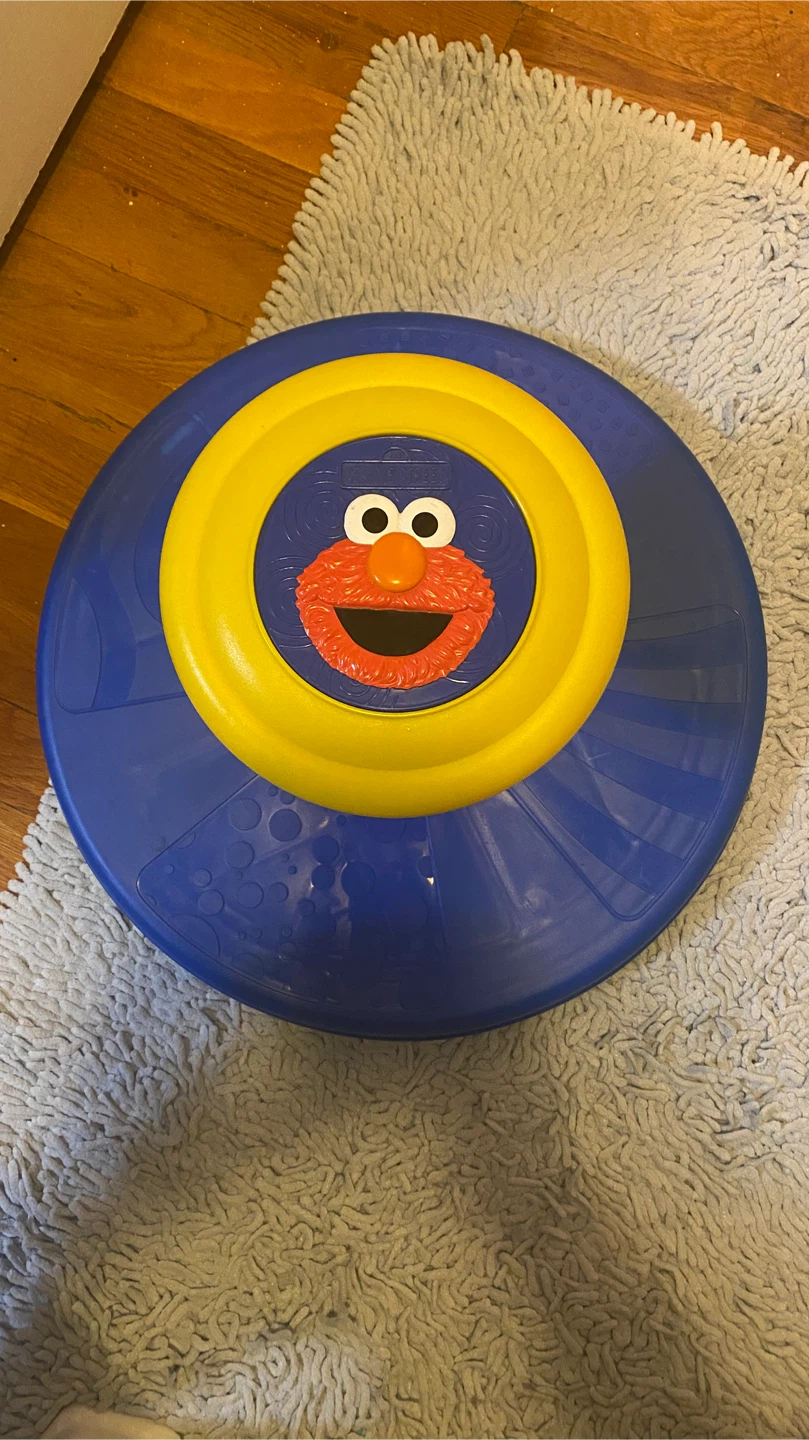 Sesame Street Elmo Ride-On Spinner Toy