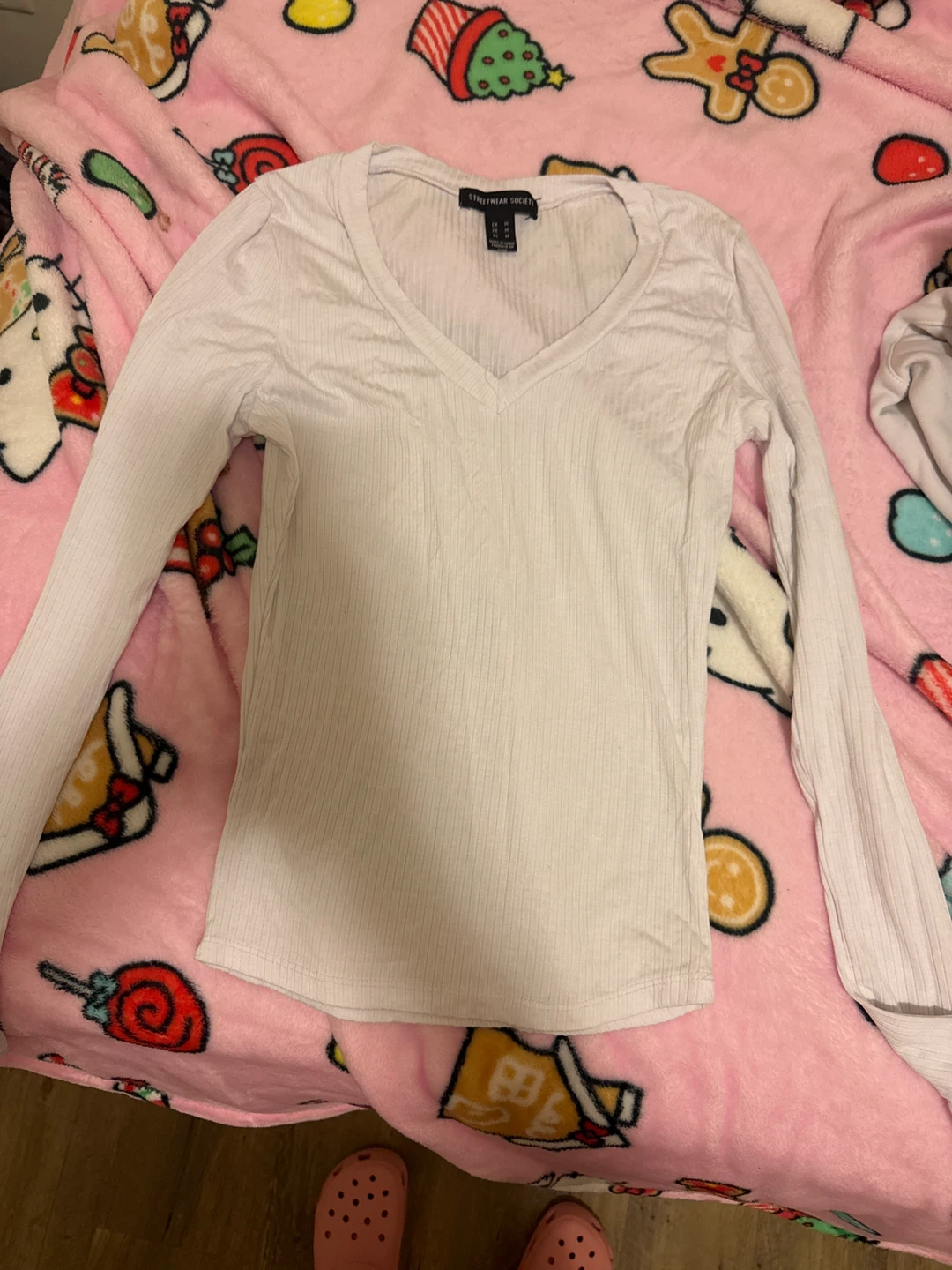 White long sleeve V-neck