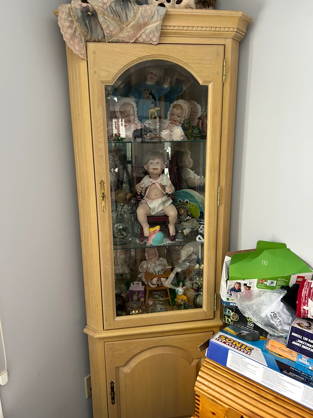 Corner Display Cabinet with Dolls
