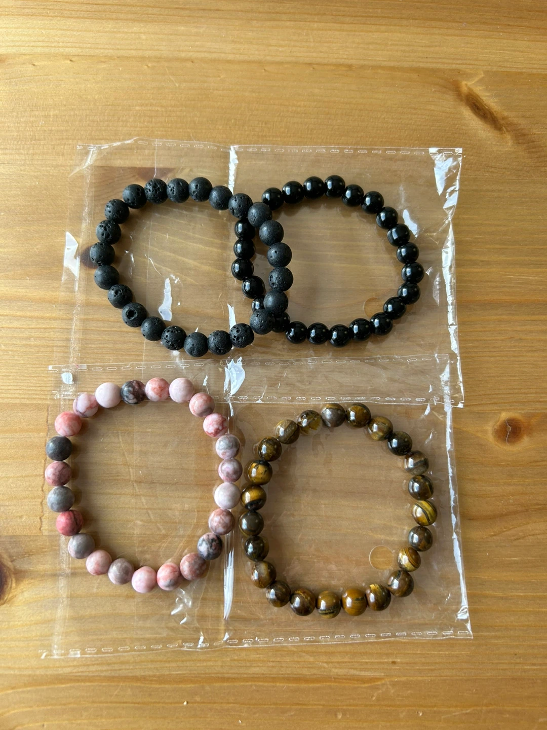 4 Bracelets: Lava Stone, Onyx, Rose Quartz, Tiger Eye