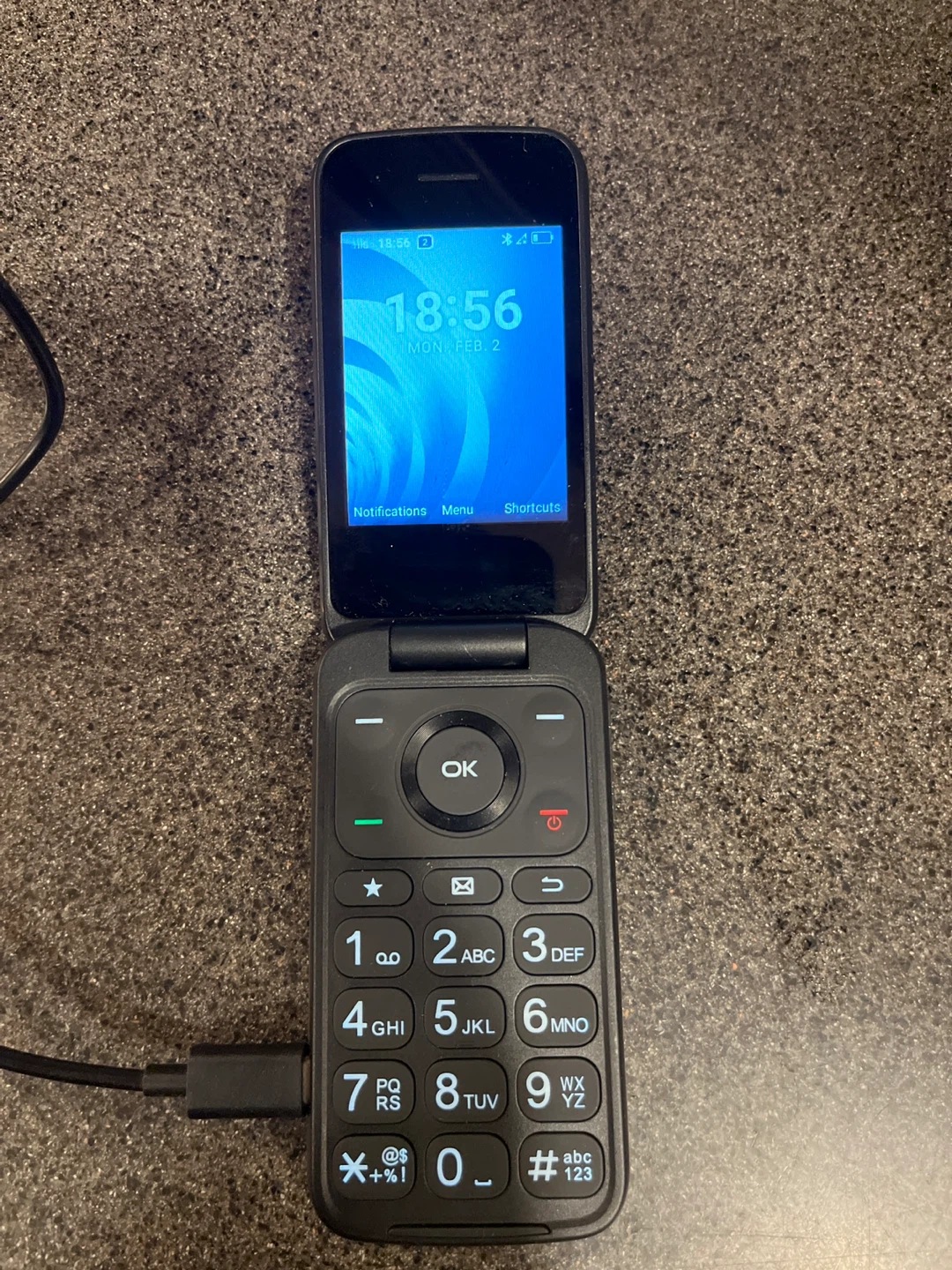 TCL Flip Phone and charger - photo 2