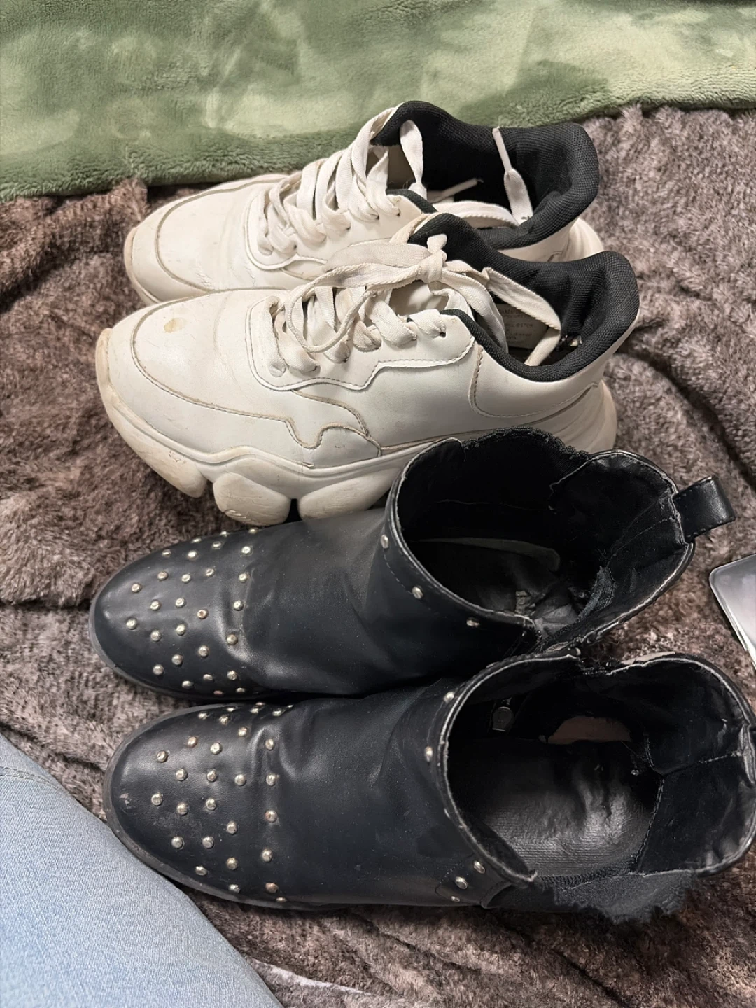 White Sneakers and Black Studded Ankle Boots