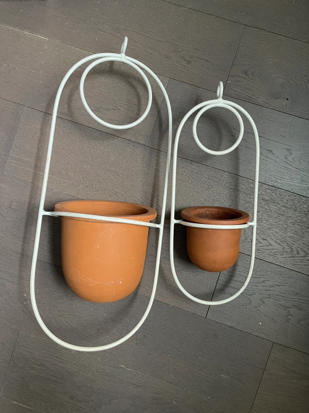 Set of 2 White Metal Hanging Planters with Terracotta Pots
