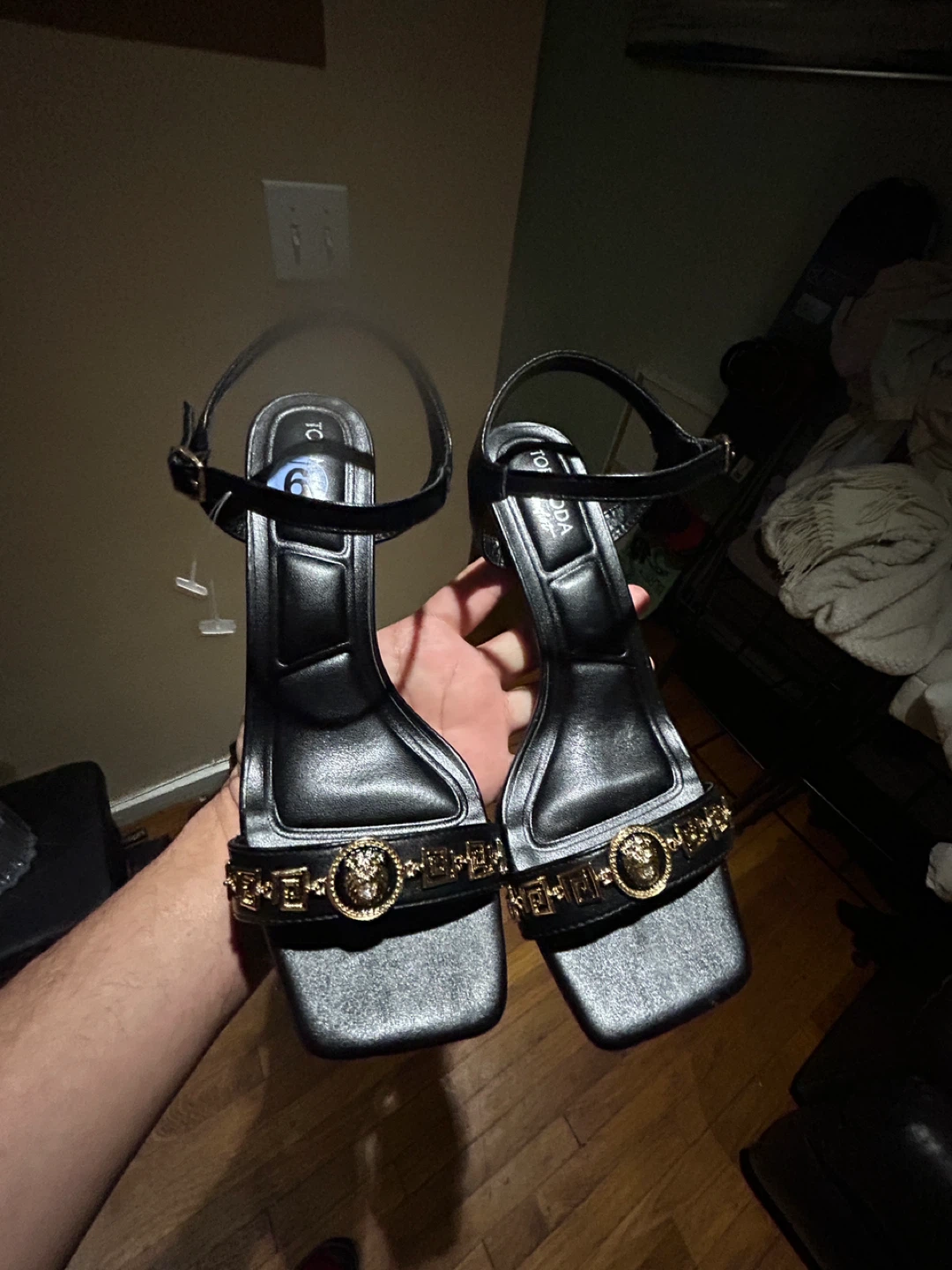Black Heeled Sandals with Gold Embellishments