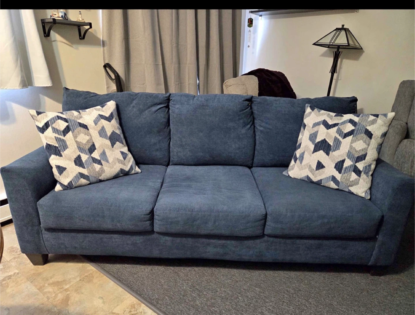 Blue Sofa with Decorative Pillows