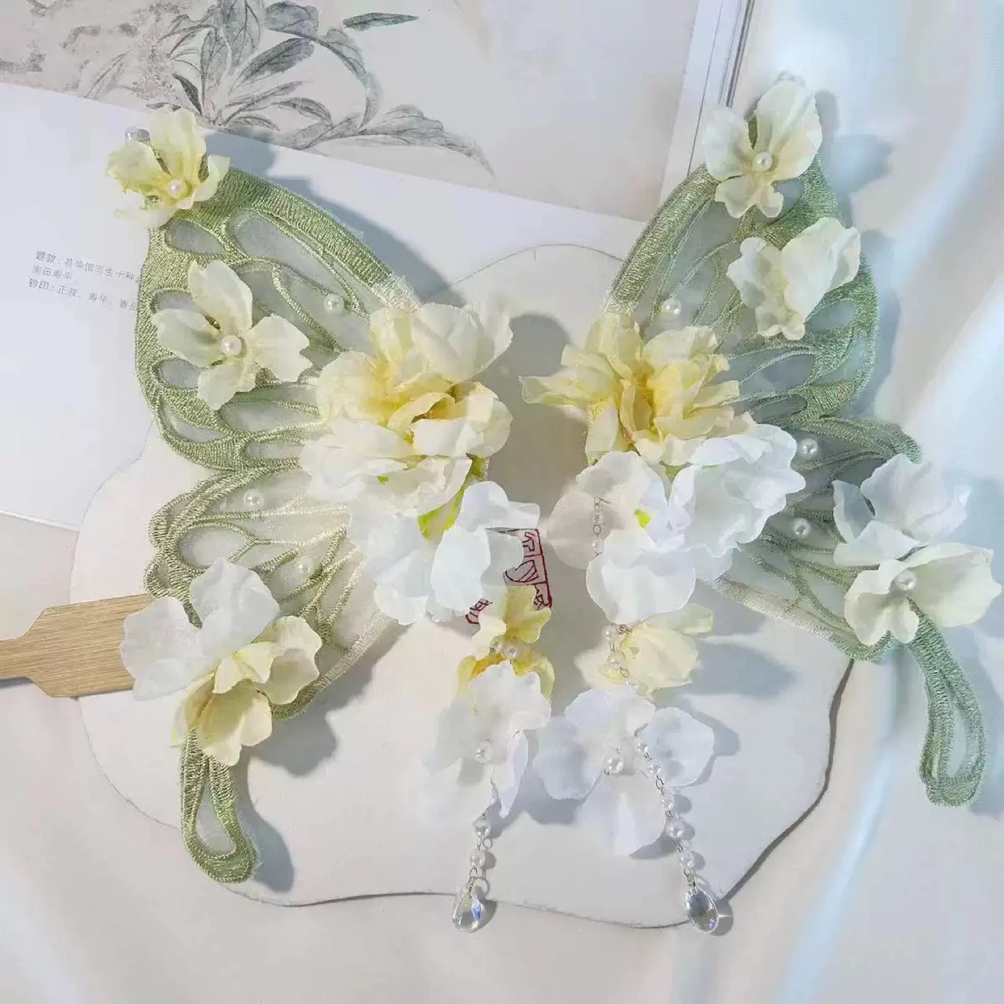 Butterfly Wing Hair Accessory with Floral Embellishments