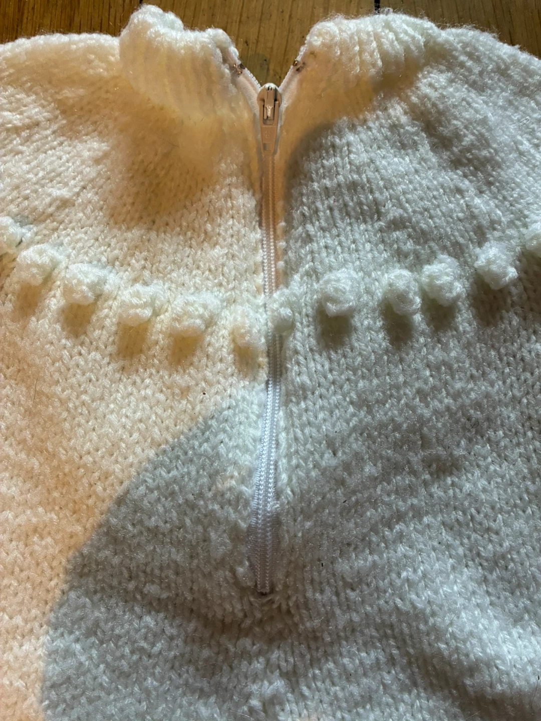 Handmade knitted baby romper with pom poms - photo 5