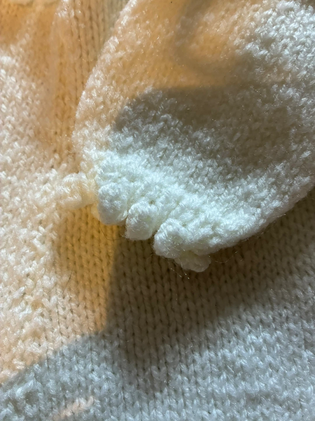 Handmade knitted baby romper with pom poms - photo 3