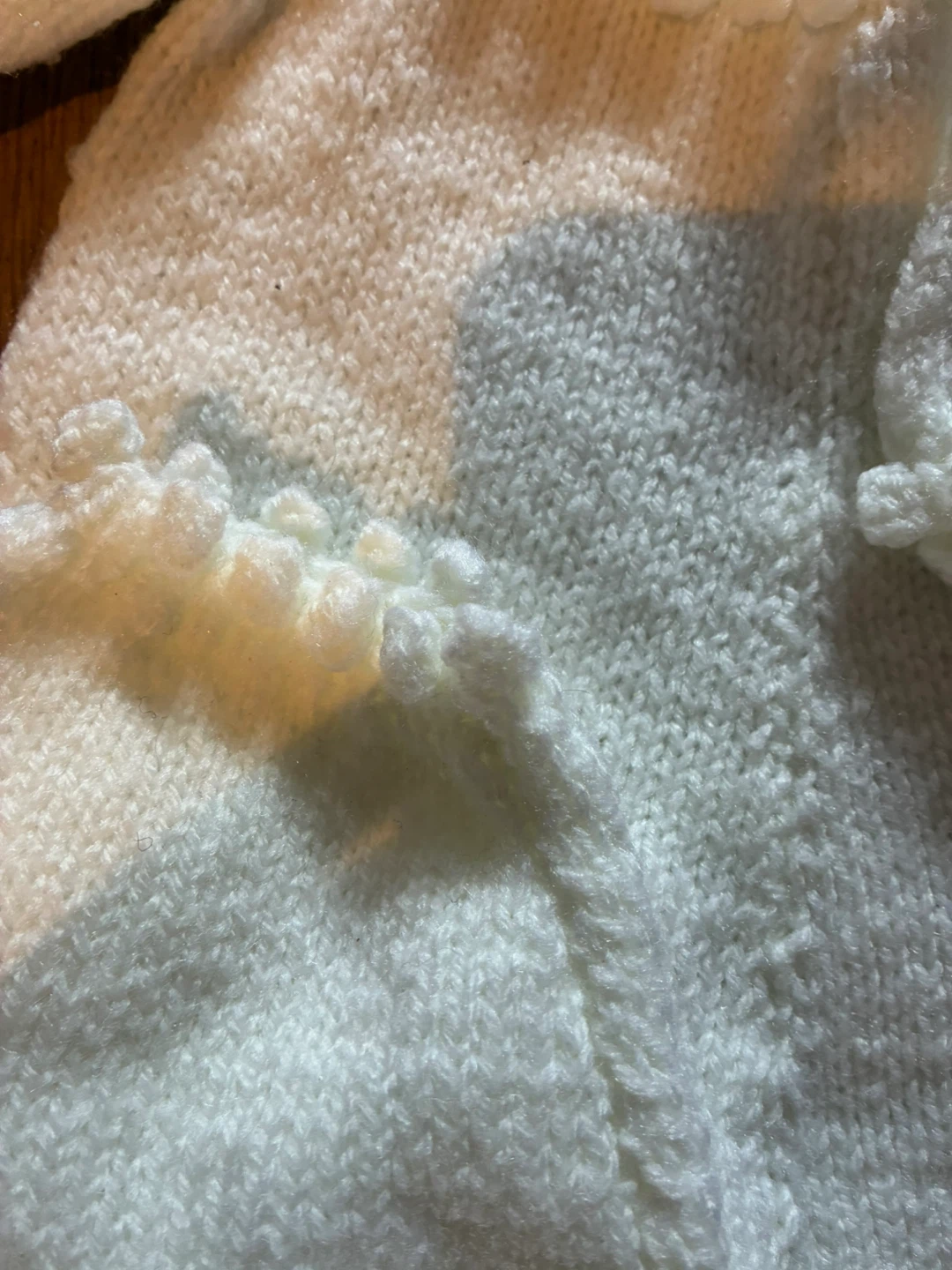 Handmade knitted baby romper with pom poms - photo 4