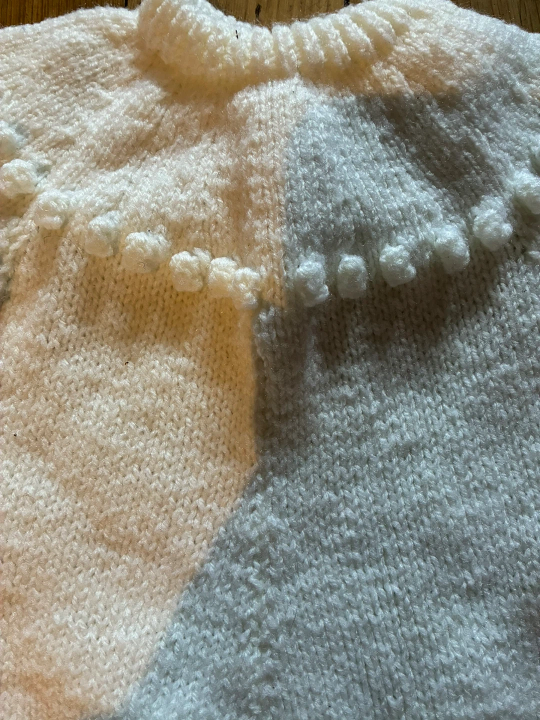 Handmade knitted baby romper with pom poms - photo 2