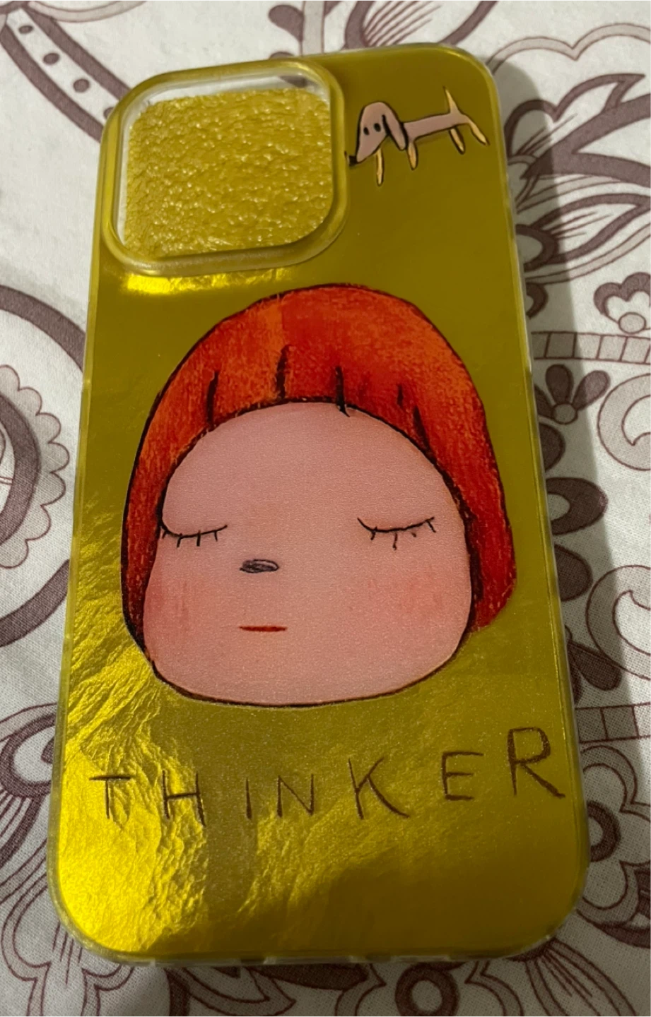 IPhone 16 Pro Case with "THINKER" text and cartoon art.