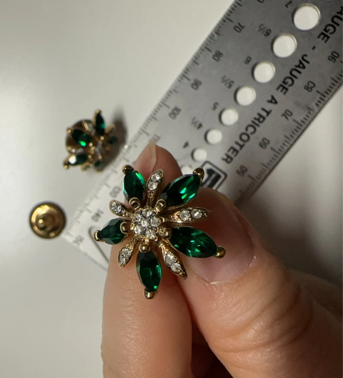 Gold tone flower earrings with green and clear stones - photo 2